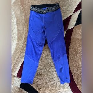 Purple knee to calf length Nike leggings